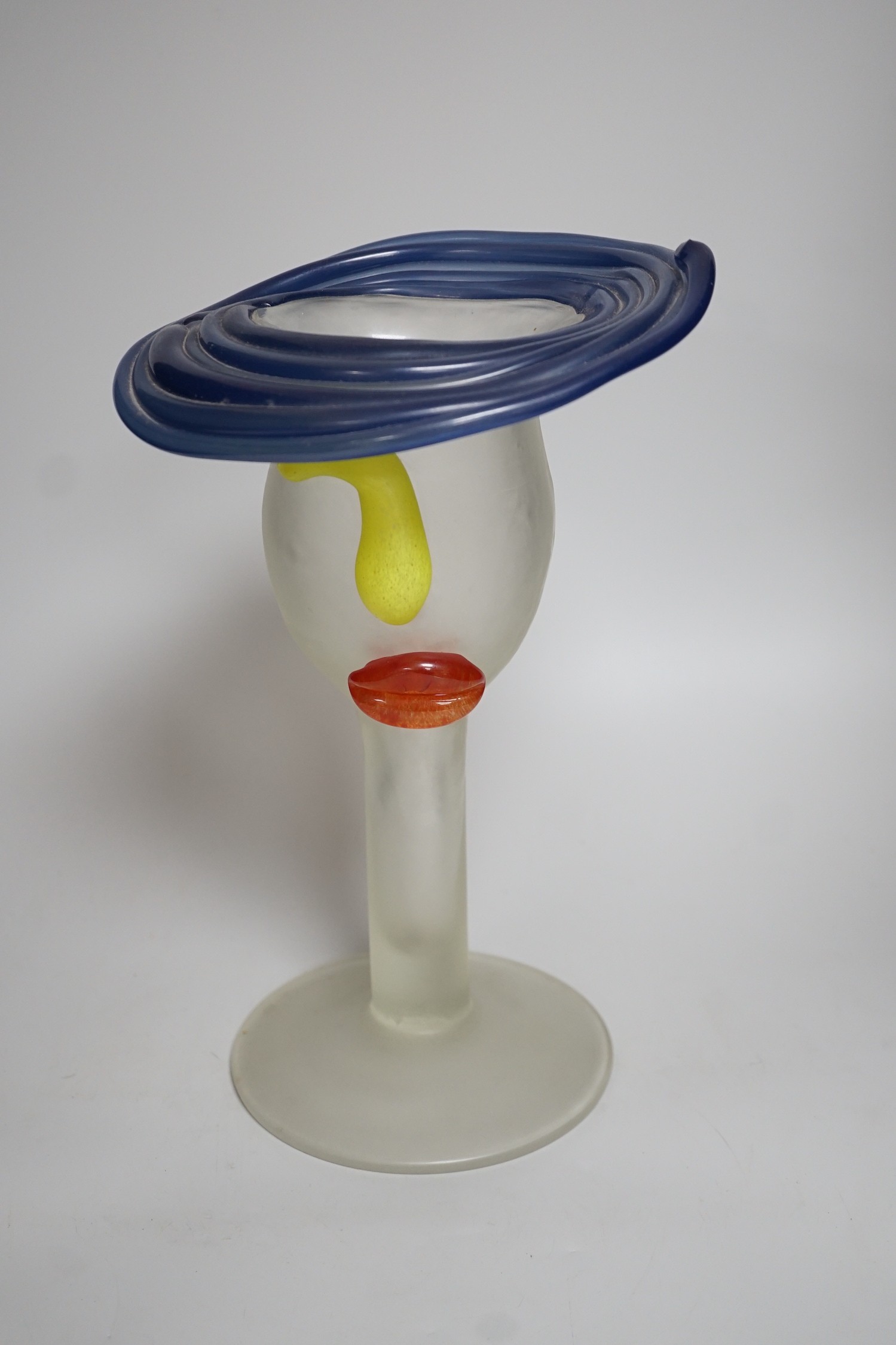 A novelty multi coloured head shaped studio glass vase, height 33cms